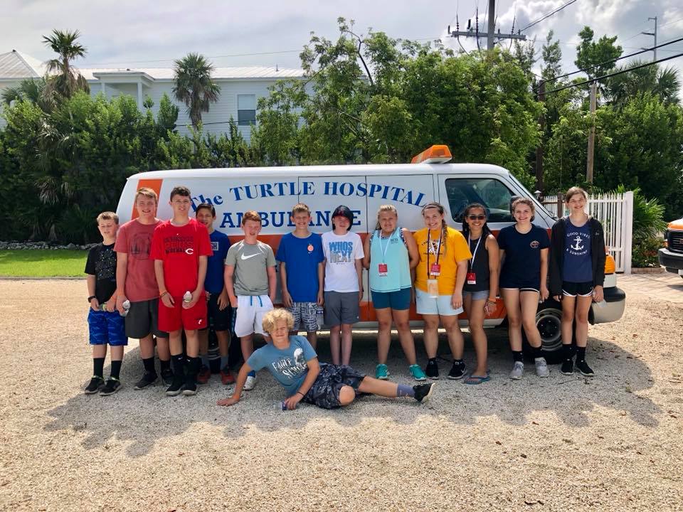 students visiting a sea turtle hospital in Florida